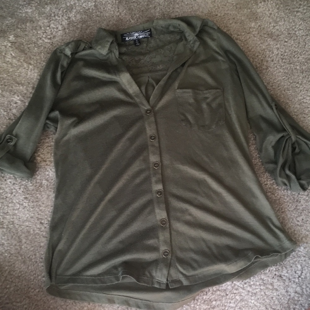 Green button up shirt with pocket.